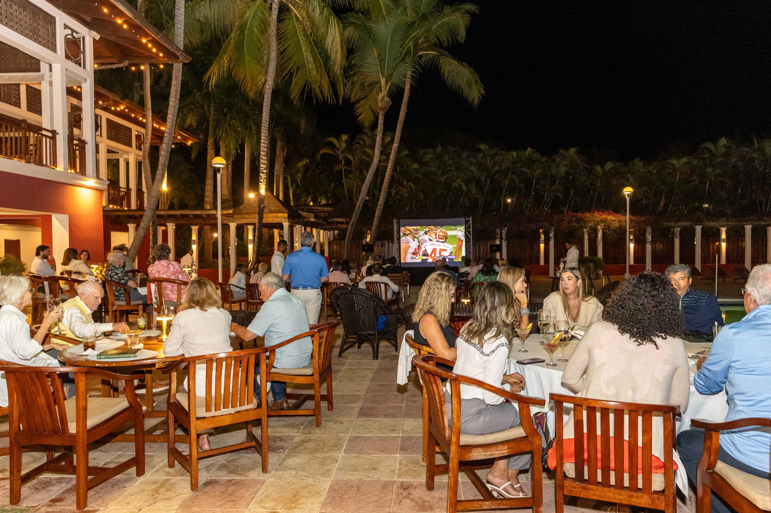 La Romana Country Club celebrates the Super Bowl with an outdoor screen, snacks, and plenty of camaraderie
